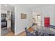 Dining area with a view into the kitchen and living room at 3738 Yorktown Pl, Raleigh, NC 27609