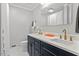 Modern bathroom boasts double vanity and hexagon tile floors at 3738 Yorktown Pl, Raleigh, NC 27609