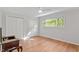 Spacious bedroom with wood floors and large window at 3738 Yorktown Pl, Raleigh, NC 27609