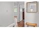 Bright hallway with views into bedrooms and bathroom at 3738 Yorktown Pl, Raleigh, NC 27609