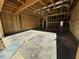 Unfinished basement with concrete floor at 595 Husketh Rd, Youngsville, NC 27596