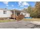 Home exterior showcasing wooden deck and pool at 60 Bogey Ln, Louisburg, NC 27549