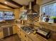 Kitchen features gas range, stainless steel appliances, and tiled backsplash at 82 Woodspryte Hollow Rd, Timberlake, NC 27583