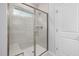Modern shower with glass enclosure and built-in seat at 2840 Huxley Way, Apex, NC 27502