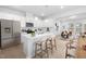 Modern kitchen with white cabinets and a large island at 2864 Huxley Way, Apex, NC 27502