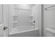 Clean bathroom with a bathtub and shower at 2864 Huxley Way, Apex, NC 27502