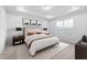 Bright bedroom with large window, neutral color palette, and carpeted floor at 2884 Huxley Way, Apex, NC 27502