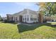 Brick ranch home with sunroom and landscaping at 4720 Ivy Crest Ct, Raleigh, NC 27604