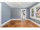 Bright dining area with hardwood floors and view into kitchen at 619 N Mebane St, Burlington, NC 27217