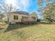 Home's back features a deck and a spacious yard at 805 Ledgerock Rd, Wake Forest, NC 27587