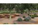 Relaxing community park with wooden platforms and flowering plants at 62 Windchime Ct, Fuquay Varina, NC 27526