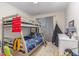 bedroom with a bunk bed and playful decor at 296 Douglas Falls Dr, Wendell, NC 27591