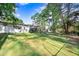 Spacious backyard with lush lawn and fire pit area at 7435 Nc 581 Hwy # G, Kenly, NC 27542