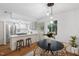 Modern kitchen features stainless steel appliances and white shaker cabinets at 1917 Washington St, Durham, NC 27704