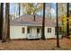 Back of house, featuring a screened porch and deck at 7204 Bocage Pl, Wake Forest, NC 27587