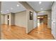 Hardwood floors and archways leading to other rooms at 1355 Shamrock Dr, Burlington, NC 27215