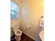 Small bathroom with toilet and pedestal sink at 4114 Sykes St, Cary, NC 27519