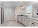 Spa-like bathroom with double vanity and large shower at 8832 Tartan Clan Dr, Willow Springs, NC 27592