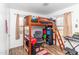 Bedroom with a twin-size loft bed, desk, and chair at 1717 Martin Luther King Dr, Rocky Mount, NC 27801