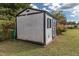 White storage shed with weathered exterior at 1717 Martin Luther King Dr, Rocky Mount, NC 27801