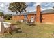 Home with backyard patio furniture and pizza oven at 1717 Martin Luther King Dr, Rocky Mount, NC 27801