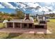 Outdoor kitchen featuring a pizza oven and grill at 1717 Martin Luther King Dr, Rocky Mount, NC 27801