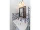 Bathroom features a vanity with gray mosaic tile at 1717 Martin Luther King Dr, Rocky Mount, NC 27801