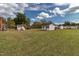 Large backyard with sheds and grassy area at 1717 Martin Luther King Dr, Rocky Mount, NC 27801