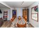 Spacious dining area with wood table and chairs at 1717 Martin Luther King Dr, Rocky Mount, NC 27801