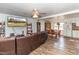 Spacious living room with leather sectional sofa and hardwood floors at 1717 Martin Luther King Dr, Rocky Mount, NC 27801
