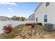 Home features a deck and fenced-in backyard at 737 Crackling Ct, Zebulon, NC 27597