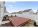 Home features a deck and fenced-in backyard at 737 Crackling Ct, Zebulon, NC 27597