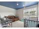 Bedroom with a daybed, crib, and a blue ceiling at 737 Crackling Ct, Zebulon, NC 27597