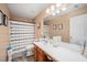 Bathroom with double vanity and a shower/tub combo at 104 Full Moon Ct, Garner, NC 27529