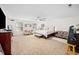 Large bedroom with king-size bed and ceiling fan at 104 Full Moon Ct, Garner, NC 27529