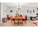 Bright dining room with a round table and six chairs at 104 Full Moon Ct, Garner, NC 27529