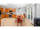 Kitchen with wooden cabinets, stainless steel appliances, and breakfast area at 104 Full Moon Ct, Garner, NC 27529