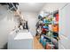 Laundry room with washer, dryer, and ample storage at 104 Full Moon Ct, Garner, NC 27529