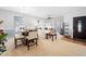 Living room with comfy sofas and large window at 104 Full Moon Ct, Garner, NC 27529