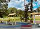 Playground with swings and play equipment at 190 Nimble Way # 218, Clayton, NC 27520