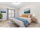 Bedroom with queen bed, window, and neutral decor at 252 E Webber Ln, Clayton, NC 27527