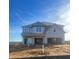 Two-story house with wrap-around porch and attached two-car garage at 2727 Lacy Holt Rd, Graham, NC 27253