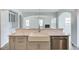 Modern kitchen with white cabinets, quartz countertops, and farmhouse sink at 2802 Lacy Holt Rd, Graham, NC 27253