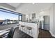 Modern kitchen with stainless steel appliances and city views at 122 N Harrington St # 1225, Raleigh, NC 27603