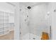 Large walk-in shower with marble tile and glass enclosure at 211 Sacred Fire Rd, Louisburg, NC 27549