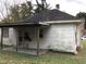 Rear view of the house showing a covered porch at 313 E Umstead St, Durham, NC 27707