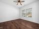 Spacious bedroom featuring hardwood floors and large windows at 1103 Kimball Crest Ct, Fuquay Varina, NC 27526