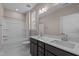 Bathroom with double vanity, tub shower combo and mirror at 129 Pearl St # 6, Garner, NC 27529