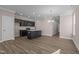 Open concept kitchen, dining, and living area at 129 Pearl St # 6, Garner, NC 27529