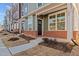 Inviting townhouse entrance with brick accents at 129 Pearl St # 6, Garner, NC 27529